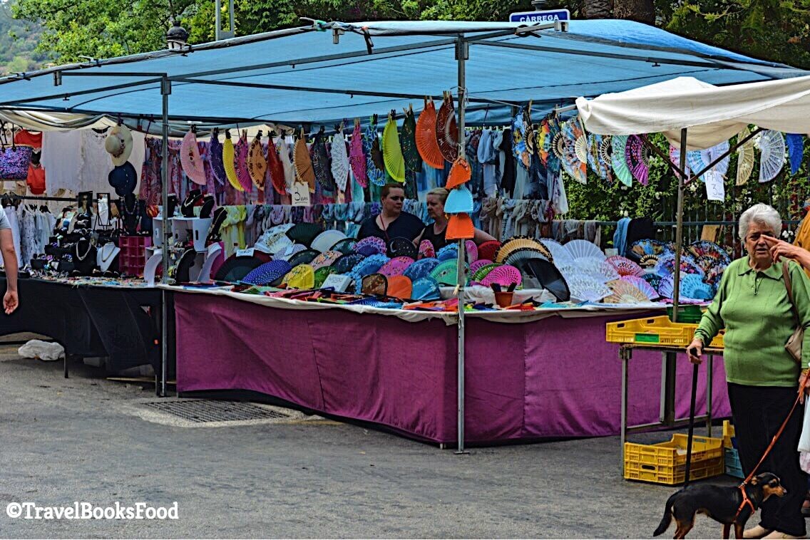 A sunday market in Soller selling some colorful material