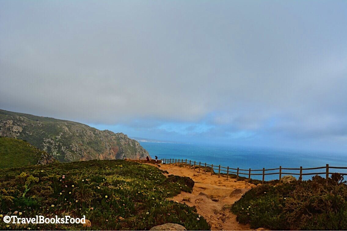 This is a photo of Cabo Da Roca, the western most point of Continental Europe. You see the cliffs hugging the clouds with the sea in the distance