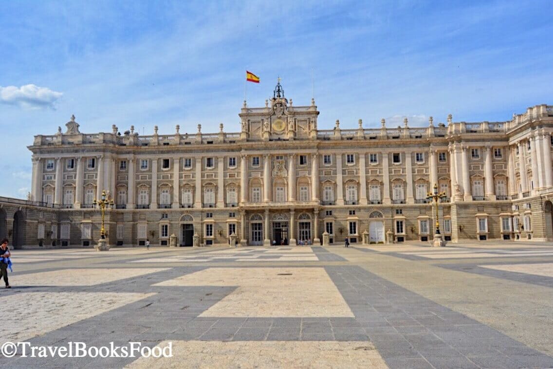 Photo of the Royal Palace in Madrid. This is the largest palace in Europe by floor area. From outside it is a massive cream building.