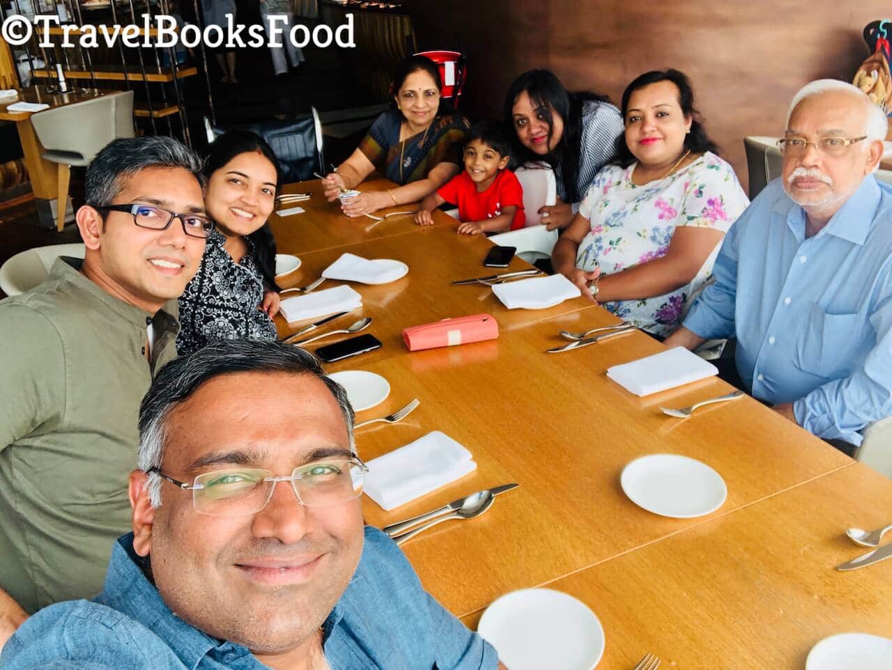 A picture of my family taken inside a restaurant in Hilton, Kuala Lumpur