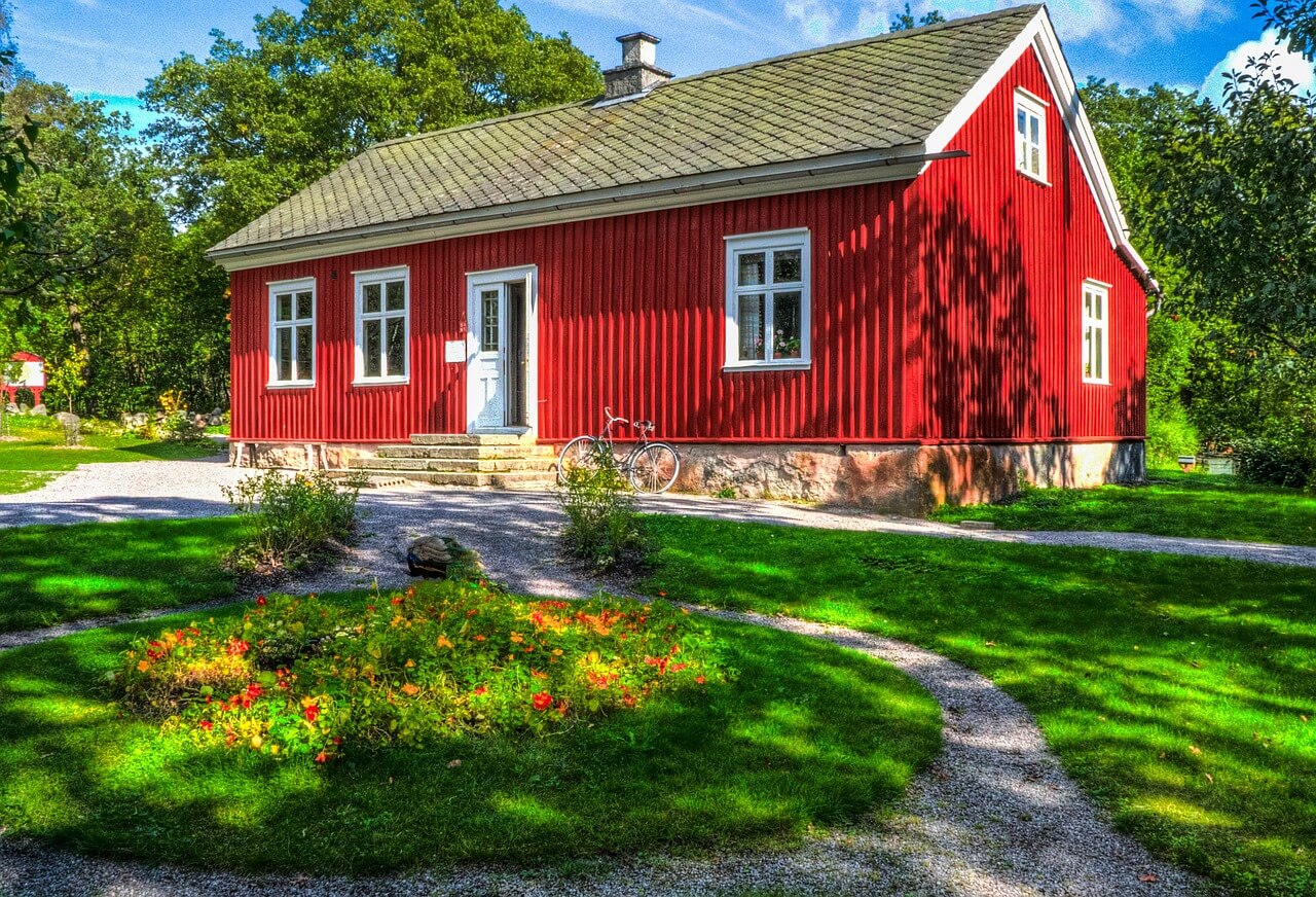 A red house with a nice yard in Sweden