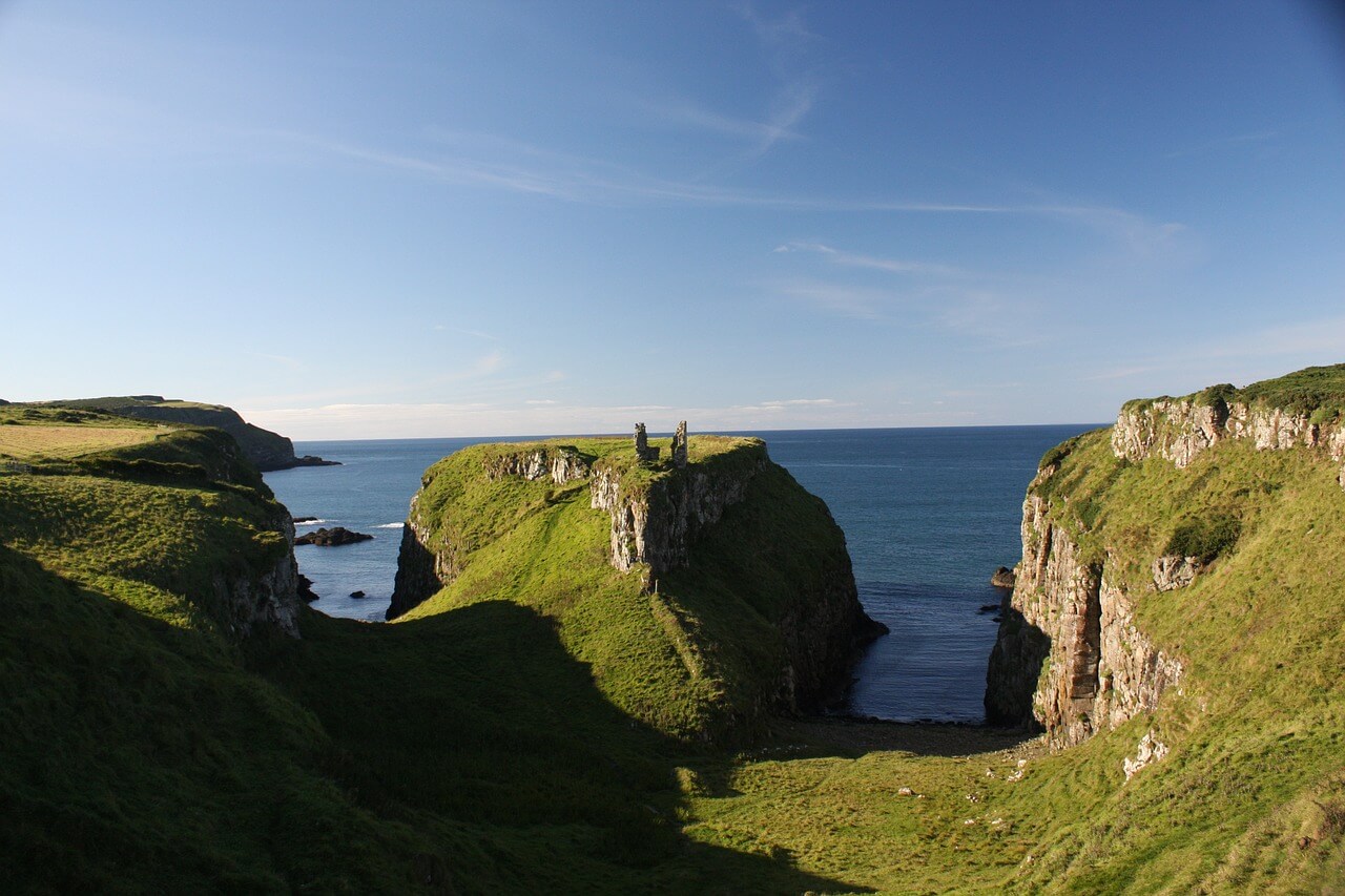 A photo of few green cliffs in Northern Ireland