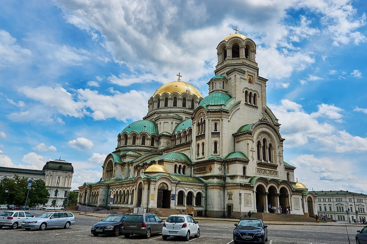 A cathedral with green and golden domes in Sofia, Bulgaria