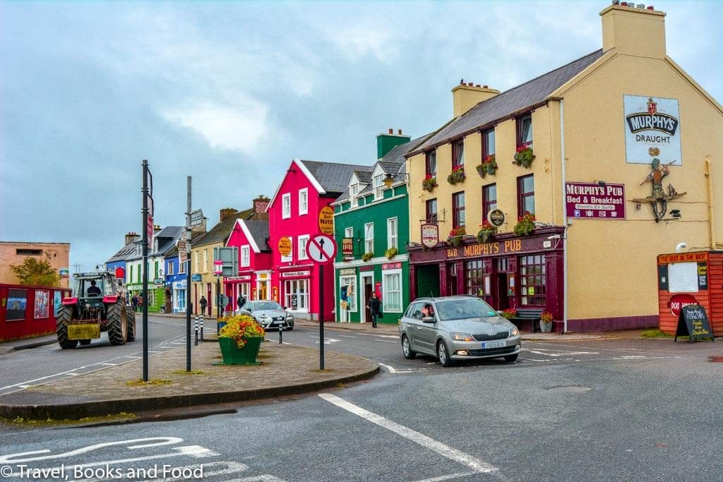 A street in the colourful town of Dingle in Europe with different coloured buildings