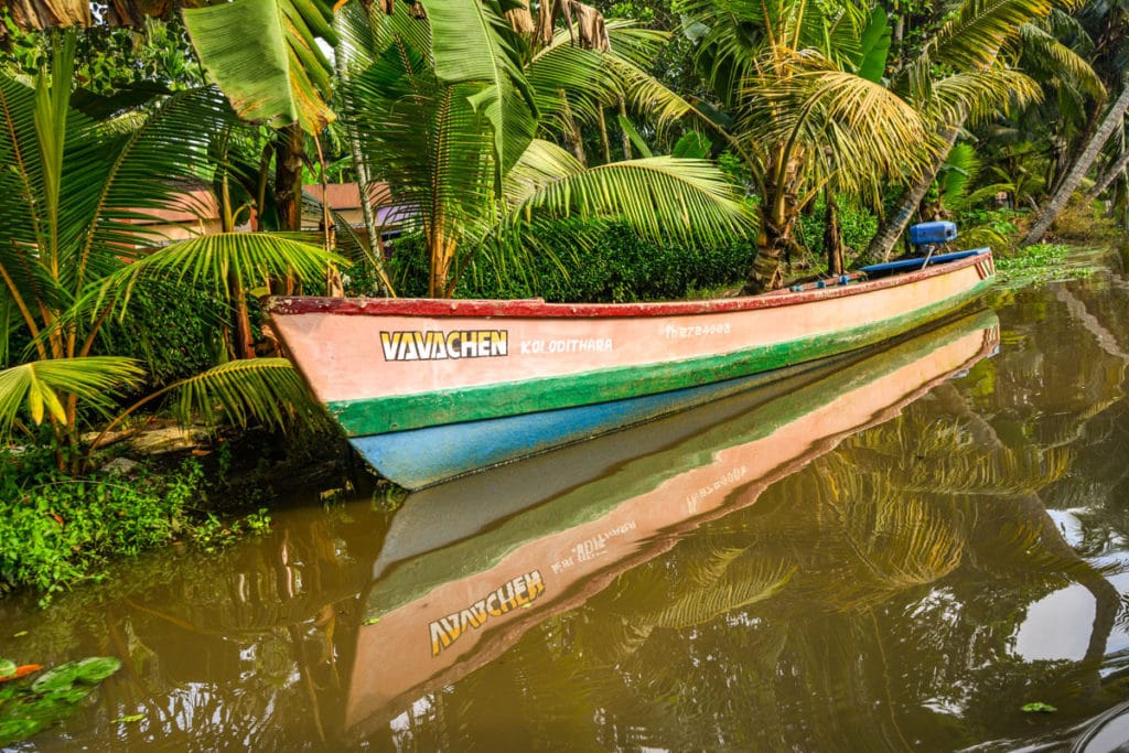 A colourful boat in the backwaters of Kerala; Kerala_Human_By_Nature_Walk_down_Memory_Lane