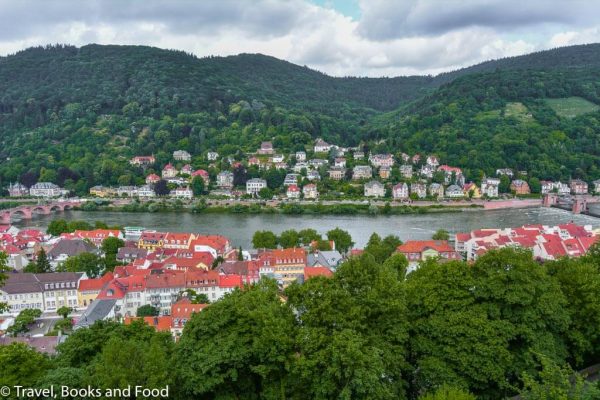 The pretty romantic city of Heidelberg surrounded by lots of green mountains